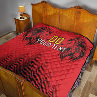 Red custom quilt blanket on bed with black lion-palm design, “00” and “YOUR TEXT”
