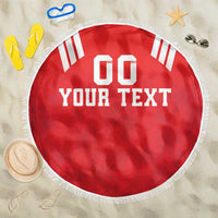Red round beach blanket with white fringe and centered "YOUR TEXT" graphic with "00" above