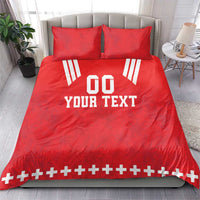 Red duvet cover set with two pillows; white “DO YOUR TEXT” rugby print and cross hem border.