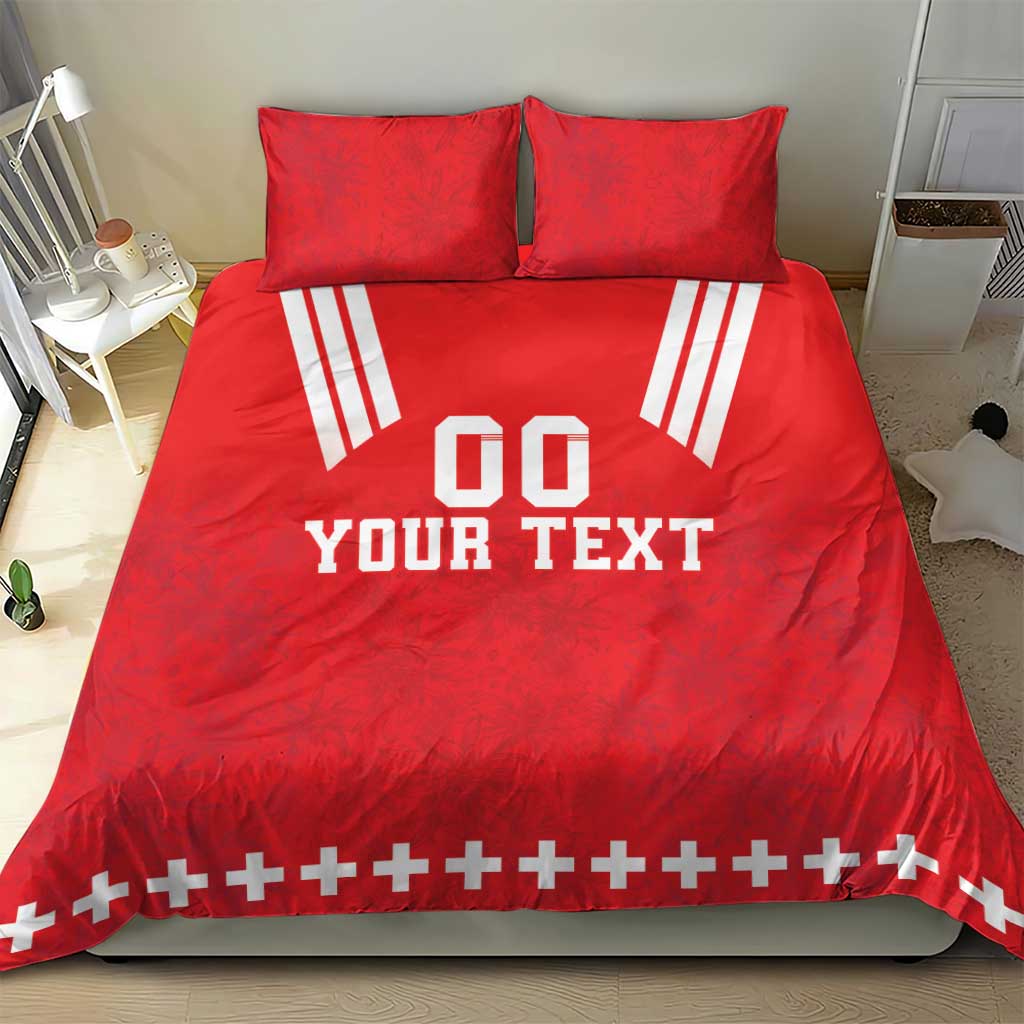 Red bedding duvet set with two pillows; white “DO YOUR TEXT” rugby graphic and stripe details.