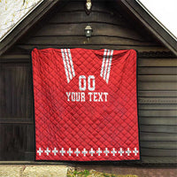 Red custom quilt blanket with white V stripes, “00” and “YOUR TEXT,” plus sign border