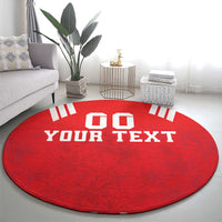 Red round rug with white “YOUR TEXT” title and “00” graphic blocks
