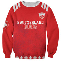 Red rugby sweatshirt with white text 'SWITZERLAND RUGBY' and Edelweiss crest