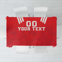 Red rugby tablecloth with white geometric pattern and "YOUR TEXT" print