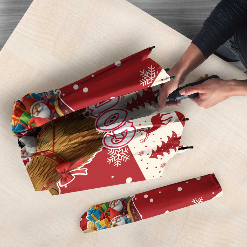 Red Christmas umbrella fabric panel with God Jul print, reindeer, and snowflake motifs
