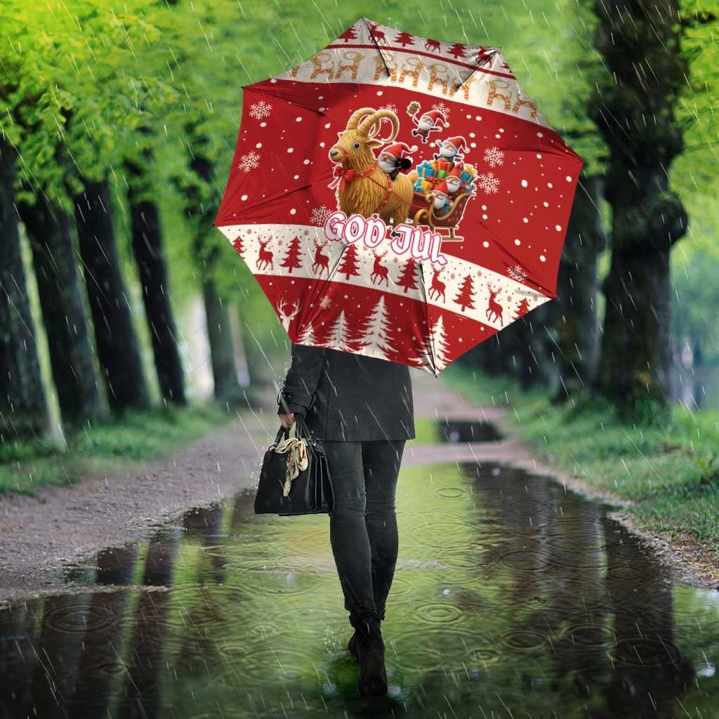Red Christmas umbrella with God Jul lettering, reindeer and fir trees, snowflake accents