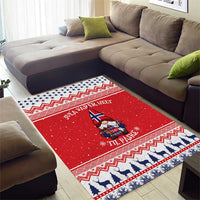 Red Christmas area rug with gnome in hat, Norwegian text, blue horse-and-tree border