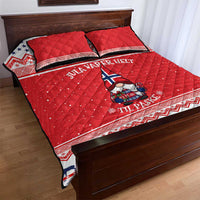 Red Christmas quilt bed set with gnome graphic, flag accents, and two pillowcases