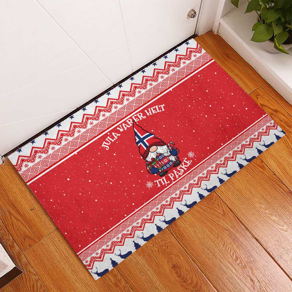 Red Christmas rubber doormat with Nordic trim, gnome in blue hat centered