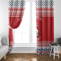 Red Christmas window curtain pair with gathered tie at top and Nordic hem with blue silhouettes