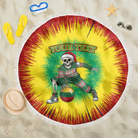 Round beach blanket with tassel edge, yellow-red-green tie-dye and skeleton basketball graphic