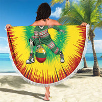 Round beach blanket with tassel border, bright tie-dye sunburst and skeleton dunk design