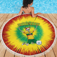 Round beach blanket with white fringe, yellow-green-red tie-dye skeleton soccer pose