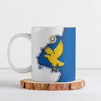 Ceramic mug with blue flag design, yellow eagle over map outline, white body