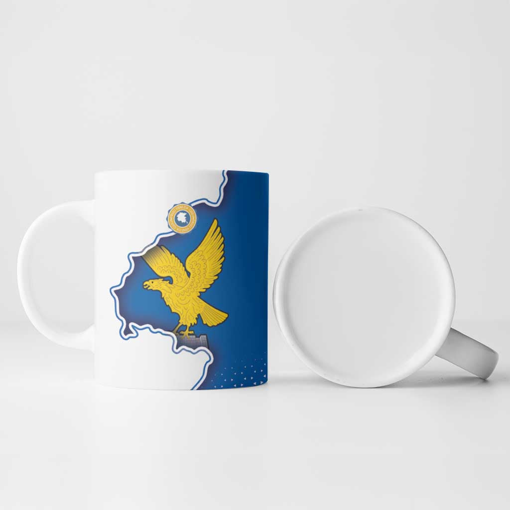 Ceramic mug with blue flag panel and yellow eagle, showing front and open back