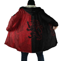 Back hooded cloak with red-and-black panels and large lion crest graphic, oversized