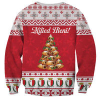 Red unisex sweatshirt with "Milied Hieni!" text and pastry Christmas tree graphic, festive border band.