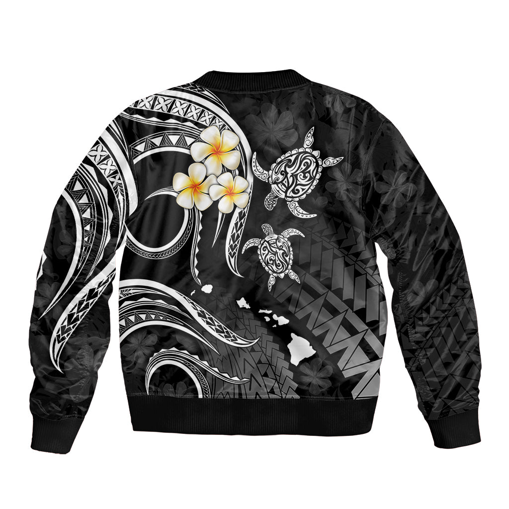Black unisex bomber jacket with all-over tribal design and plumeria-style flower on back