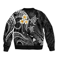 Black unisex bomber jacket with all-over tribal design and plumeria-style flower on back