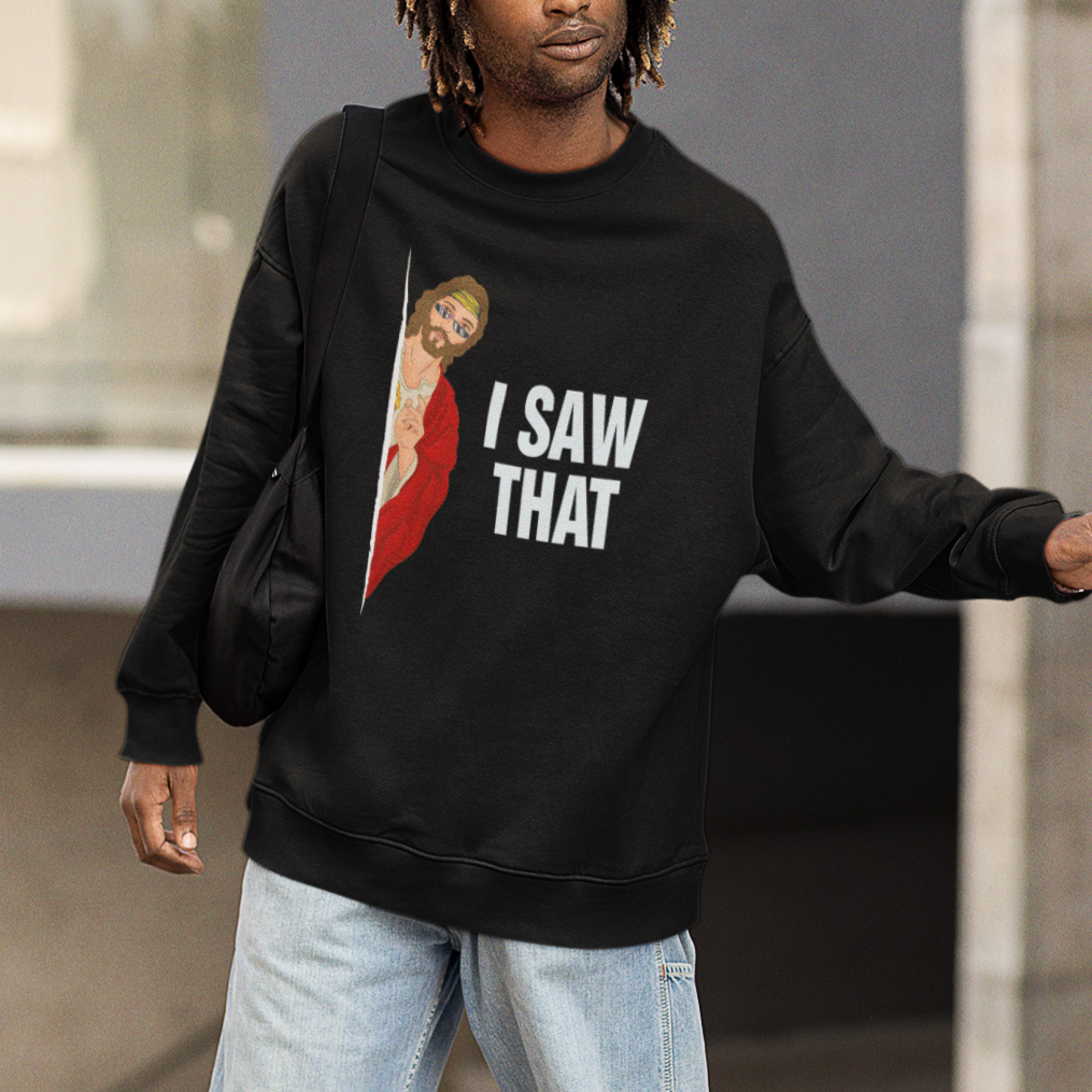 Black sweatshirt worn by man; "I SAW THAT" text with Jesus graphic on chest
