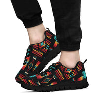 Black sole sneakers with multicolor geometric Native-style pattern, white laces