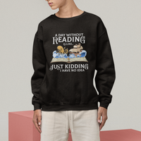 Black crewneck sweatshirt with front book-themed graphic text, shown worn.