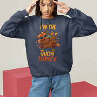 Navy Thanksgiving sweatshirt with dabbing turkey graphic and "Queen Turkey" text