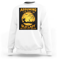 White Halloween witch sweatshirt with centered moon and broomstick graphic and quote.