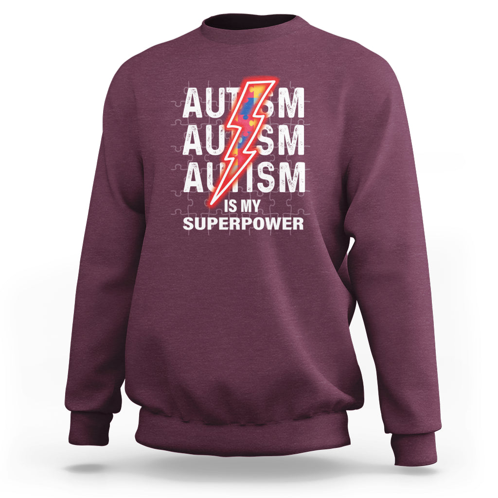 Maroon autism sweatshirt with front “AUTISM is my superpower” graphic and lightning icon
