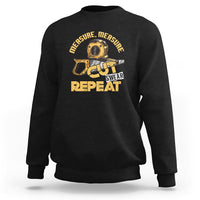 Black woodworker sweatshirt with tape-measure graphic: CUT SWEAR REPEAT