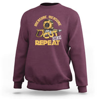 Maroon woodworker sweatshirt with tape-measure graphic: CUT SWEAR REPEAT