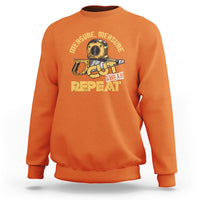 Orange woodworker sweatshirt with tape-measure graphic: CUT SWEAR REPEAT
