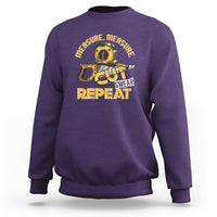 Purple woodworker sweatshirt with tape-measure graphic: CUT SWEAR REPEAT