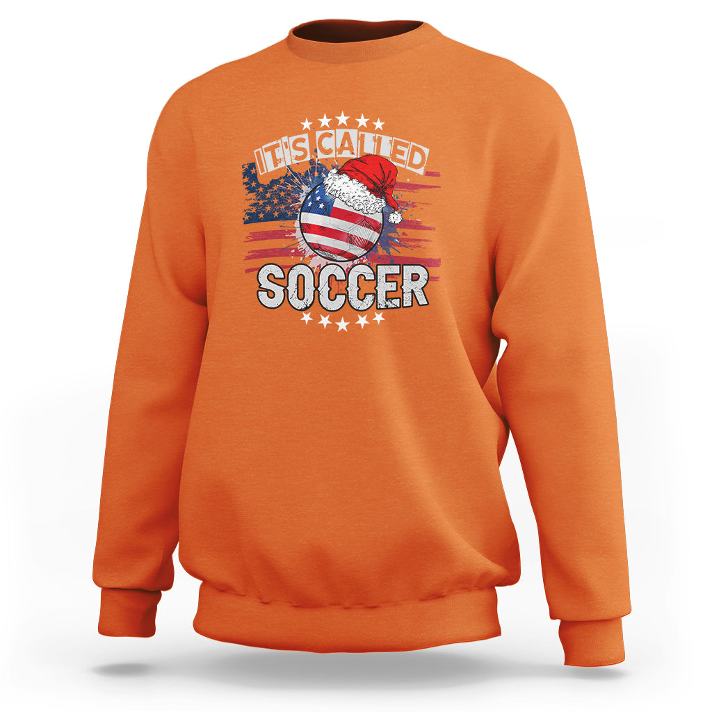 Orange Christmas soccer sweatshirt with front graphic text "It's Called Soccer"