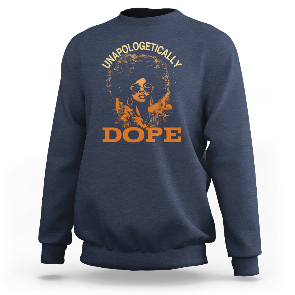 Navy crewneck sweatshirt with “UNAPOLOGETICALLY DOPE” graphic portrait on front