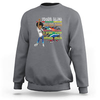 Dark heather gray crewneck sweatshirt with colorful front graphic, long sleeves and cuffs.