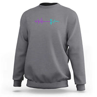 Charcoal gray crewneck sweatshirt with left-chest ECG heartbeat and teal semicolon-style graphic