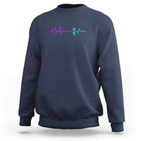 Navy crewneck sweatshirt with left-chest ECG heartbeat and teal semicolon-style graphic