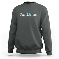 Dark heather gray crewneck sweatshirt with white “Continue” text and green semicolon graphic