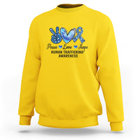 Human trafficking awareness sweatshirt in daisy yellow with Peace Love Hope heart graphic