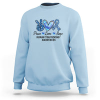 Human trafficking awareness sweatshirt in light blue with Peace Love Hope heart graphic