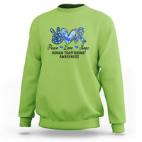 Human trafficking awareness sweatshirt in lime green with Peace Love Hope heart graphic