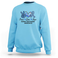 Human trafficking awareness sweatshirt in sky blue with Peace Love Hope heart graphic