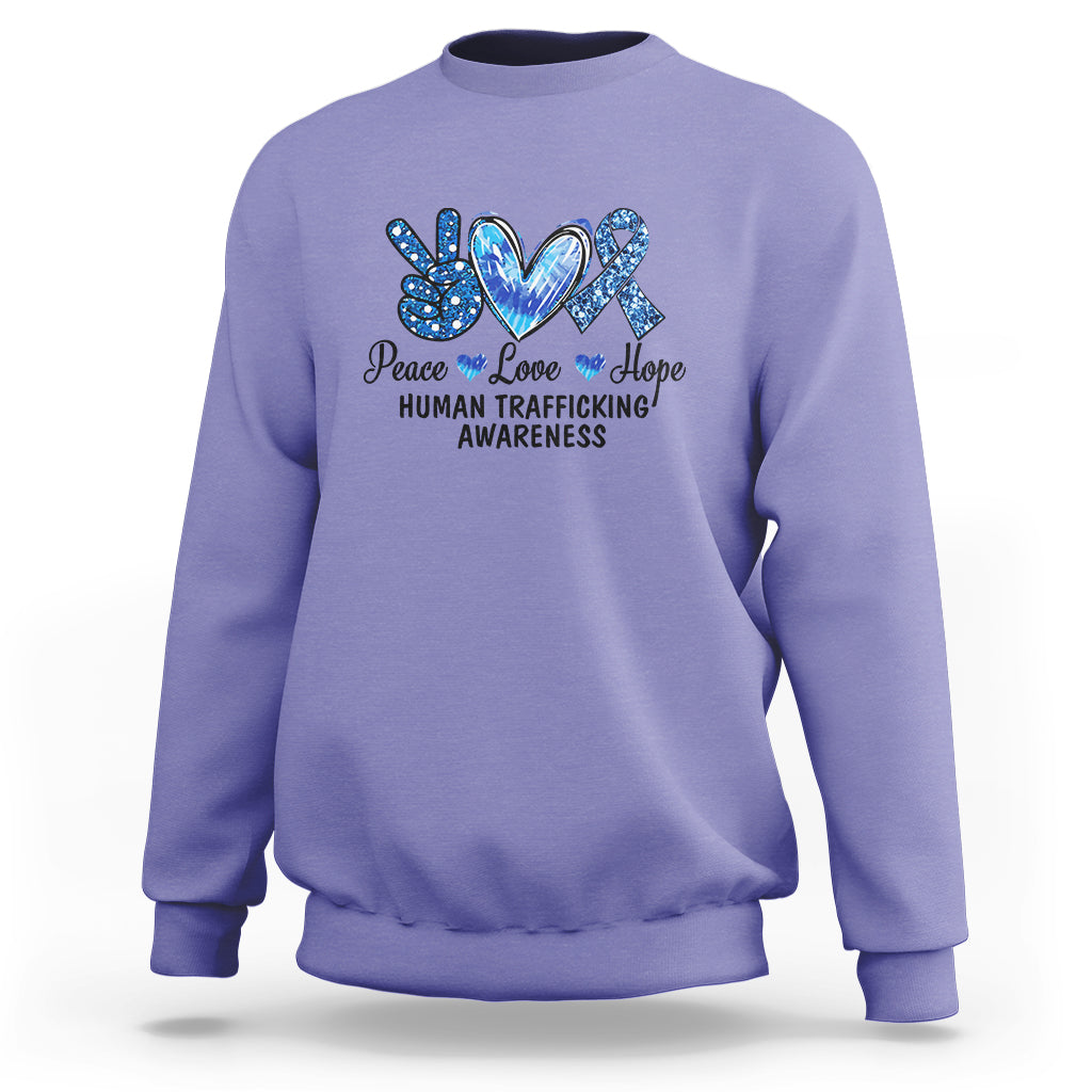 Human trafficking awareness sweatshirt in violet with Peace Love Hope heart graphic