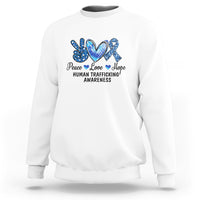 Human trafficking awareness sweatshirt in white with Peace Love Hope heart graphic