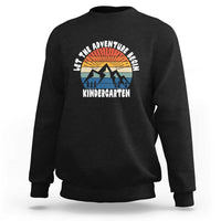 Black kindergarten sweatshirt with 'Let the adventure begin' logo and mountain sunrise graphic