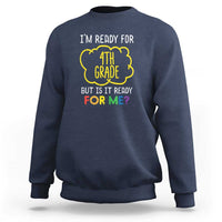 Blue crewneck sweatshirt with 4th grade graphic and colorful back-to-school text.