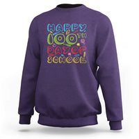 Purple crewneck sweatshirt with colorful “Happy 100th Day of School” print