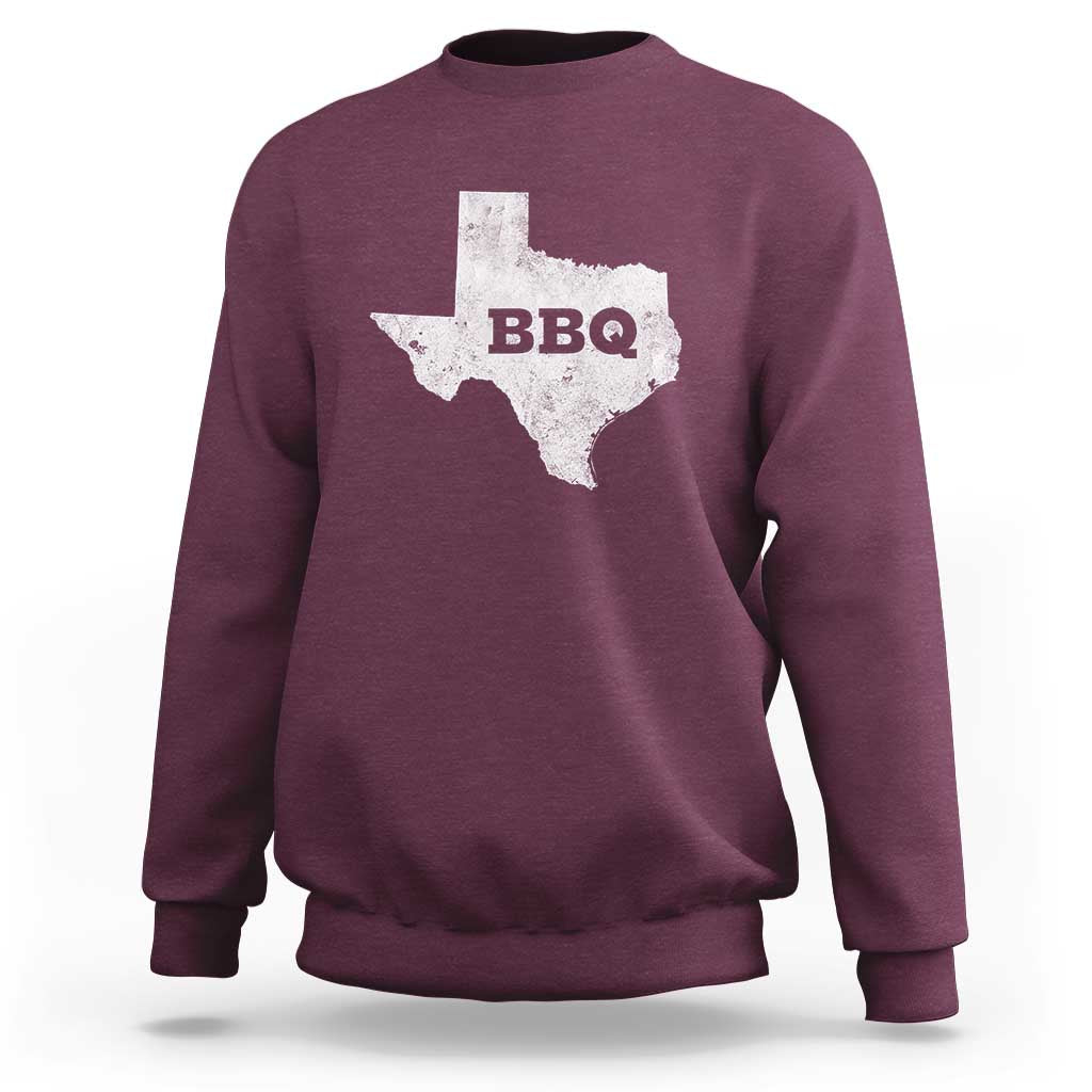 Maroon crewneck sweatshirt with Texas BBQ state graphic on back