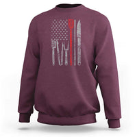 Maroon sweatshirt with American flag graphic and chef utensils printed on back